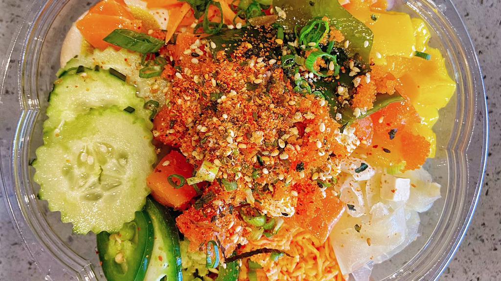 Spicy Combo Bowl · Spicy tuna, spicy salmon, tofu, green onion, seaweed, fish egg, spicy crab salad, egg, cucumber, carrot, jalapeños, pickled ginger, mango, choice of sauce, chili powder, poke seasonings, fish flakes.
These items may be served raw or undercooked based on your specification, or contain raw or undercooked ingredients.