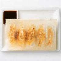 Shrimp & Kurobuta Pork Pot Stickers · Crispy, pan-fried dumplings filled with Kurobuta pork and fresh shrimp pair perfectly with o...