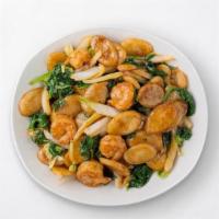 Shanghai Rice Cakes With Shrimp · Chewy rice ovalettes are sauteed with freshly-peeled shrimp, crunchy cabbage, fresh spinach,...