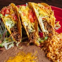 Three Tacos Combo · 3 crispy shell tacos filled with meat and topped with cheese, lettuce, tomatoes, and onions....