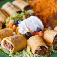 Taquitos Rancheros Combo · Rolled fried corn or flour tortillas filled with your choice of shredded beef or shredded
ch...