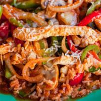 Arroz Con Pollo · Spicy. Strips of chicken breast sauteed in a red sauce with peppers, onions, tomatoes, and m...