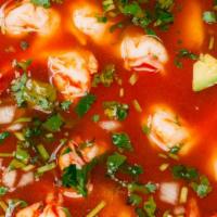 Siete Mares Soup · Spicy, gluten-free. Seafood chipotle broth with prawns, scallops, clams, octopus, mussels, f...