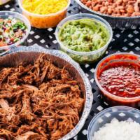 Taco Bar - 4 People · Includes everything you need to build your own tacos (3 per person): choice of protein, bean...