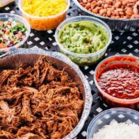 Taco Bar - 6 People · Includes everything you need to build your own tacos (3 per person): choice of protein, bean...