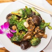 Mixed Mushrooms With Broccoli · Shiitake mushroom, straw mushroom sautéed with broccoli in a brown sauce.