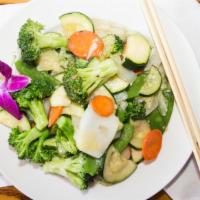 Vegetable Delight · Stir fried our fresh broccoli, carrots, Napa and zucchini in white sauce.