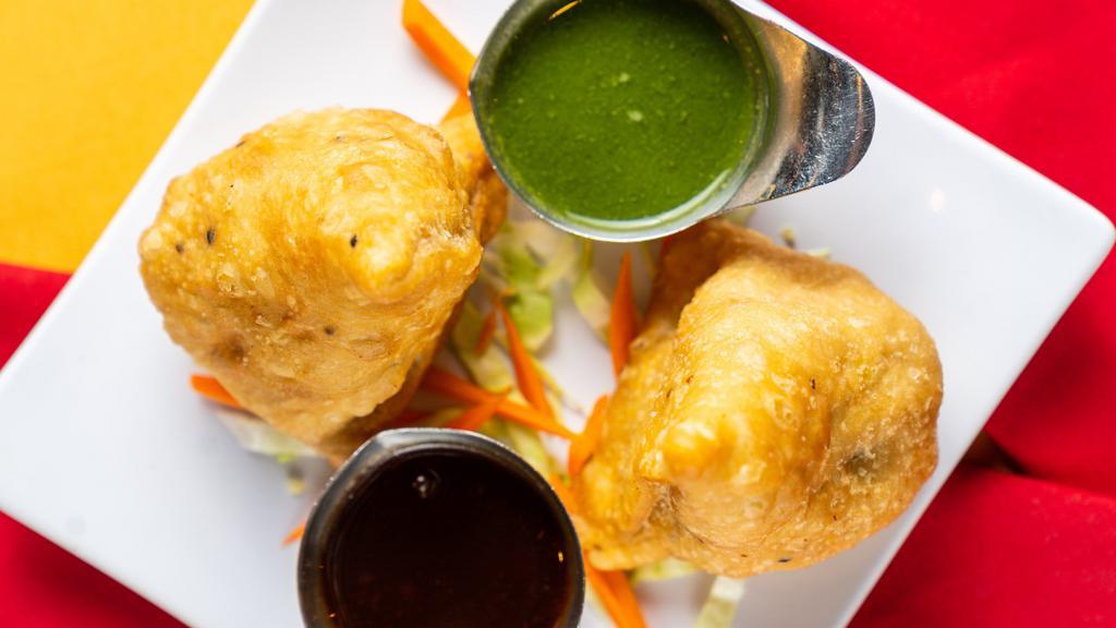 Vegetable Samosa · Vegetarian. Potato, green peas & spices wrapped in home-made pastry dough & deep-fried to golden perfection.