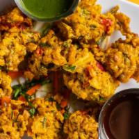 Himalayan Vegetable Platter · Vegetarian. Assortment of vegetable samosa, onion bhaji and vegetable pakora.
