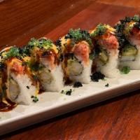 Dragon Fire · shrimp tempura and avocado topped with spicy tuna, spicy mayo, soy glaze, black tobiko and w...