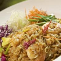 Traditional Pad Thai · Gluten-Free. Fish Sauce, Rice Noodle, Tamarind, Egg, Green Onion, Bean Sprouts, Peanuts.