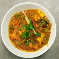 Karahi Paneer · Cottage cheese stir-fried with bell peppers, tomatoes and onion.