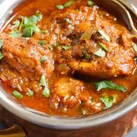 Chicken Vindaloo · Boneless chicken cooked served with potatoes in a spicy sauce.