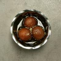 Gulab Jamun · Fluffy milk pastry soaked in honey and saffron.