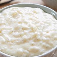 Rice Pudding · The popular dessert made with boiling milk and rice with cardamom.