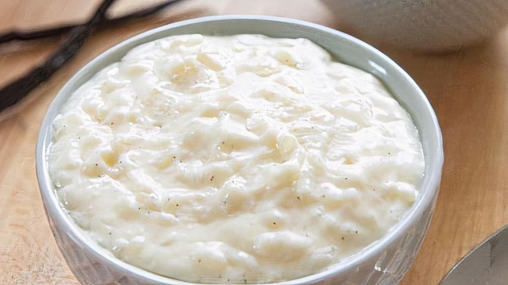 Rice Pudding · The popular dessert made with boiling milk and rice with cardamom.