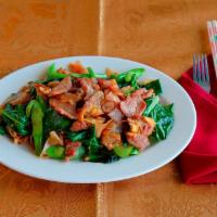 Pork Pad Si Eiw · Thai style Noodle  stir-fry with Pork uses the  extra wide fresh rice noodles cooked in an e...