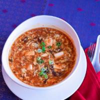 Hot & Sour Tofu Soup · The egg drop soup with a kick! This special soup is made with fresh cracked extra large USDA...