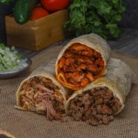 Burritos  · Your choice of freshly grilled meat wrapped in a warm flour tortilla with refried beans, moz...