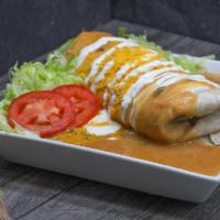 Smothered Burritos · Your choice of meat with refried beans, mozzarella cheese all wrapped in a warm flour tortil...
