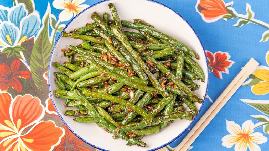 Garlic Green Beans · Green beans sautéed with garlic, soy sauce, and white pepper.