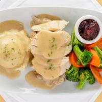 Roasted Turkey · Claire's traditional roasted turkey served with moist sage stuffing, turkey gravy, mashed po...