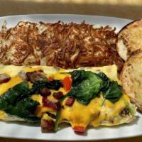 Avocado Omelet · 3-egg omelet with fresh spinach, mushrooms, onion, bell pepper, topped with avocado and ched...