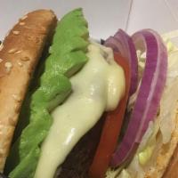 Avocado Burger · 1/3 lb. patty on a toasted sesame bun with avocado, lettuce, tomatoes, Swiss cheese and red ...