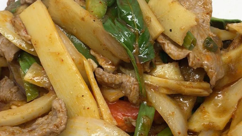 Sp11. Pad Phet · Choice of protein or vegetable with chili paste, bamboo shoot, eggplant, green onion, white onion, bell pepper and basil leaves.