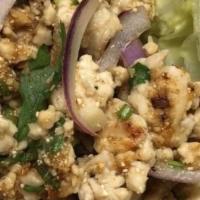 Larb · Hot and spicy dish with your choice of meat mixed with tossed ground rice, cilantro, green o...
