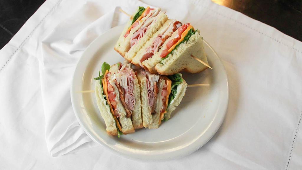 Club Sandwich (Whole) · triple decker with ham, bacon, turkey, cheddar, mayo, lettuce and tomato