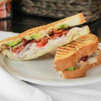 Southwest Turkey Panini (Whole) · Turkey, bacon, pepperjack cheese, avacado, tomato, red onion grilled on French bread