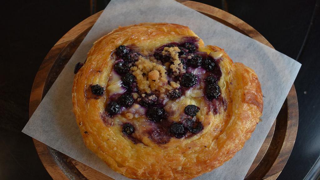 Blueberry Cream Cheese Danish · flaky pastry, with tangy cream cheese and blueberries. Served warm