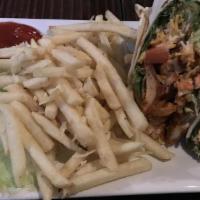 Buffalo Wrap · Crispy chicken tossed in wing sauce and homemade ranch, with lettuce, tomato, cheddar, and j...
