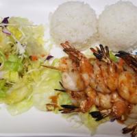 Shrimp Teriyaki · Grilled skewered shrimp with marinated teriyaki sauce. Choice of meat served with rice and s...