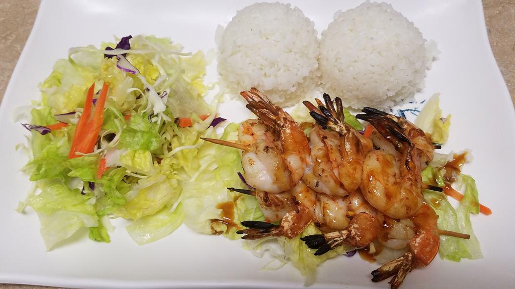 Shrimp Teriyaki · Grilled skewered shrimp with marinated teriyaki sauce. Choice of meat served with rice and salad.