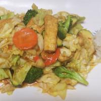 Tofu Stir-Fried · Pan-fried vegetable served with rice.