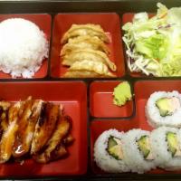 Chicken Bento · Served with rice, salad, gyoza and California roll in a bento box.