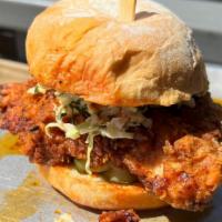 Whiskey Nashville Hot · Fried chicken thigh . Nashville hot sauce 
cole slaw . 
house-made spicy 
pickles . 
steamed...