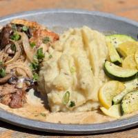 Whiskey Grilled Chicken · Grilled Chicken thigh . mushroom and onion whiskey cream sauce
garlic mashed potatoes . Seas...