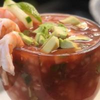 Mexican Shrimp Cocktail · Shrimp in tomato juice, mixed with cilantro, onions, tomatoes, cucumbers, avocado, (add octo...