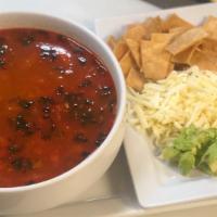 Tortilla Soup · Soup crispy tortillas in a tomato broth with grilled chicken, cooked with cilantro, tomato, ...