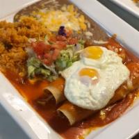 Enchiladas Sunrise · two corn tortillas filled with your choice of meat smothered in our traditional enchilada sa...