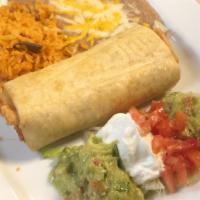 Arizona Chimichanga · A large flour tortilla deep fried with your choice of meat and filled with cheese inside. Ga...