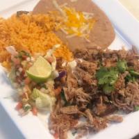 Pork Carnitas · Lean pork slow cooked with a bit of a kick. Served with Pico de Gallo, fresh limes, and our ...
