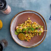 Salmon Skewer A La Plancha · Summer corn and tomato relish, creamy avocado aioli. Choice of Jasmine Rice or Side Farm Sal...
