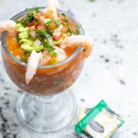 Shrimp Coctel · Whole Shrimp, diced Cucumbers, Tomatoes, Onions and Cilantro served in cup with our in-house...