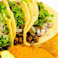 3 Carne Asada Tacos Combo · Includes rice and beans.