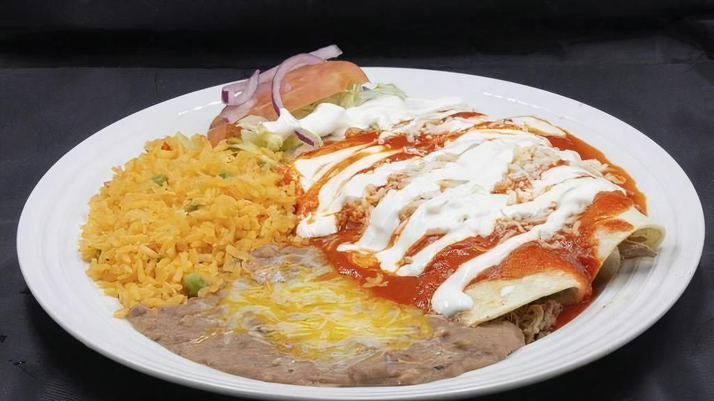 Two Enchilada Combo · Includes rice and beans.