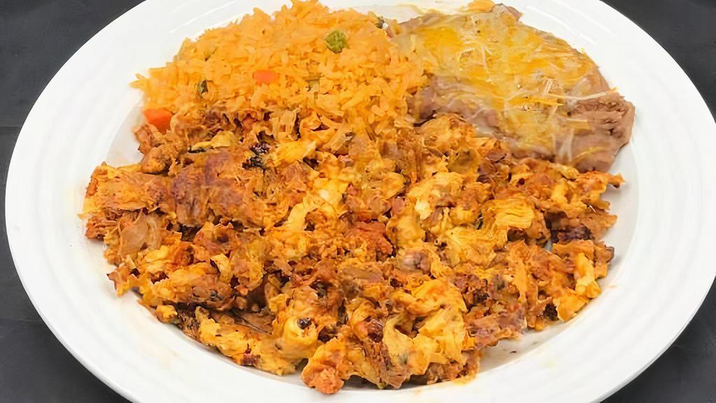 Chorizo Combo · Includes rice and beans.
